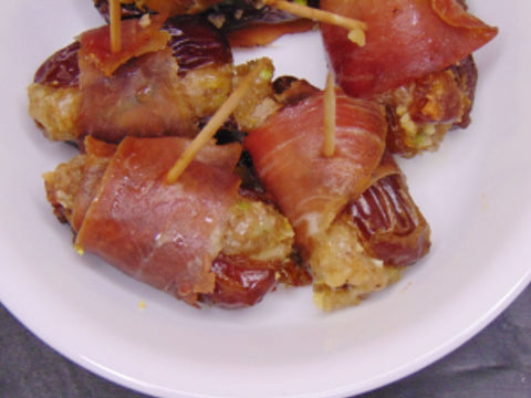 Prosciutto Wrapped Dates with Walnuts and Marn Vom Berge Cheese